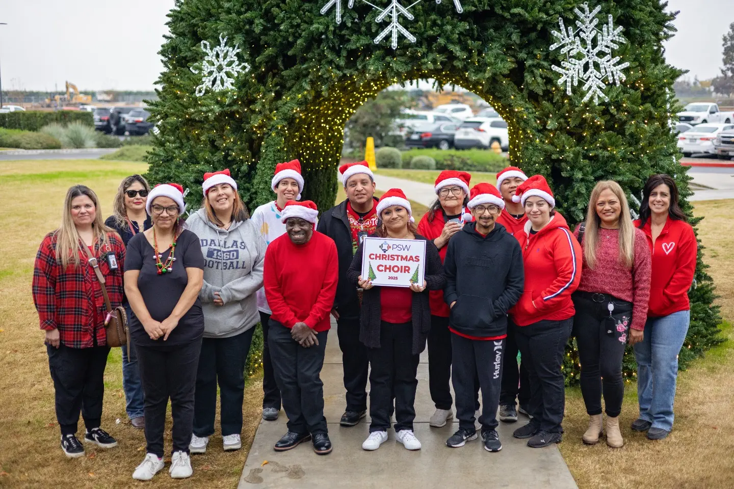Group photo of the 2025 PSW Christmas Choir outside Eagle Mountain Casino